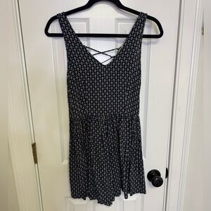 Floral Sleeveless Romper with Crisscross Back size small